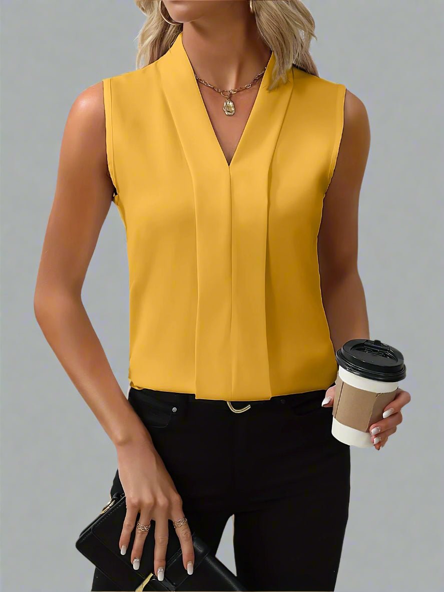 Professional women's work blouse: sleeveless V-neck, stand-collar, and pleated for an elegant office wear style.