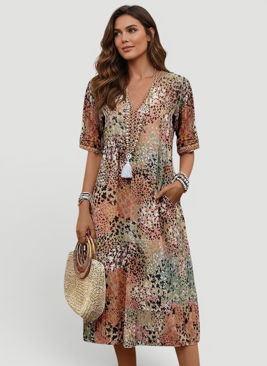 Women's V-neck summer midi dress with relaxed fit, lightweight fabric, perfect for casual elegance and warm days.