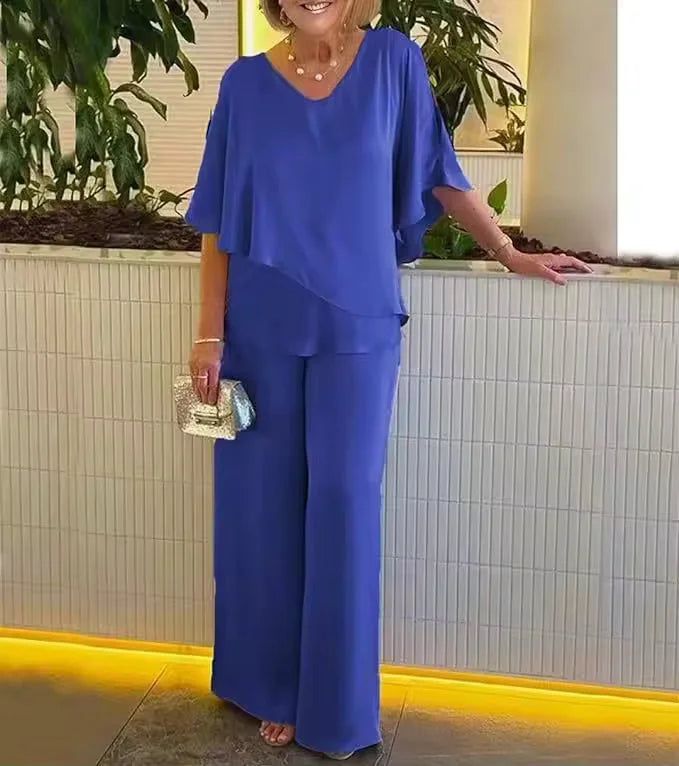 Women's V-neck top & wide-leg pants matching set in elegant fabric. Comfortable, versatile two-piece outfit.