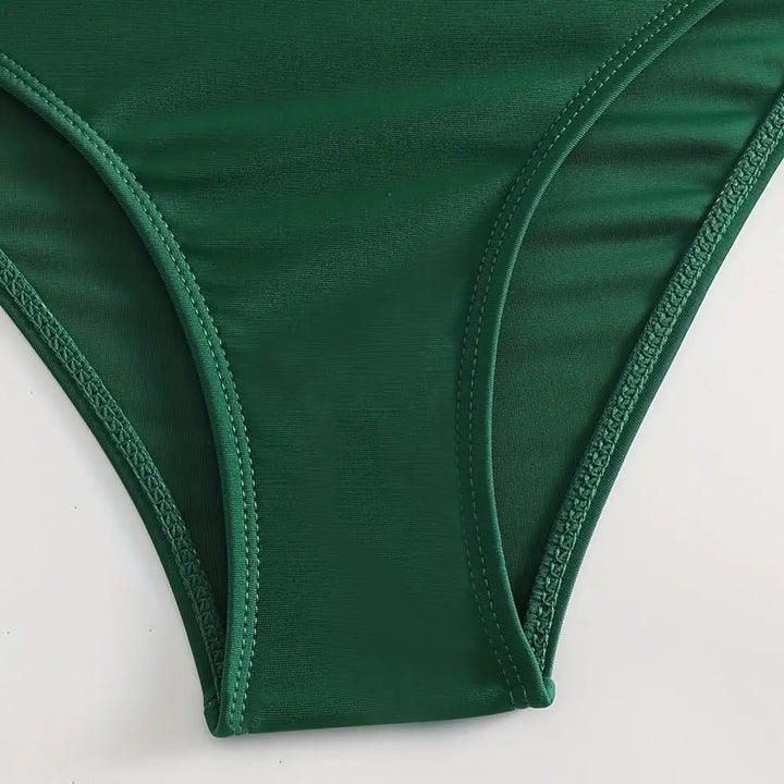 Women's tummy control two-piece swimsuit. V-neck design for a chic summer look.