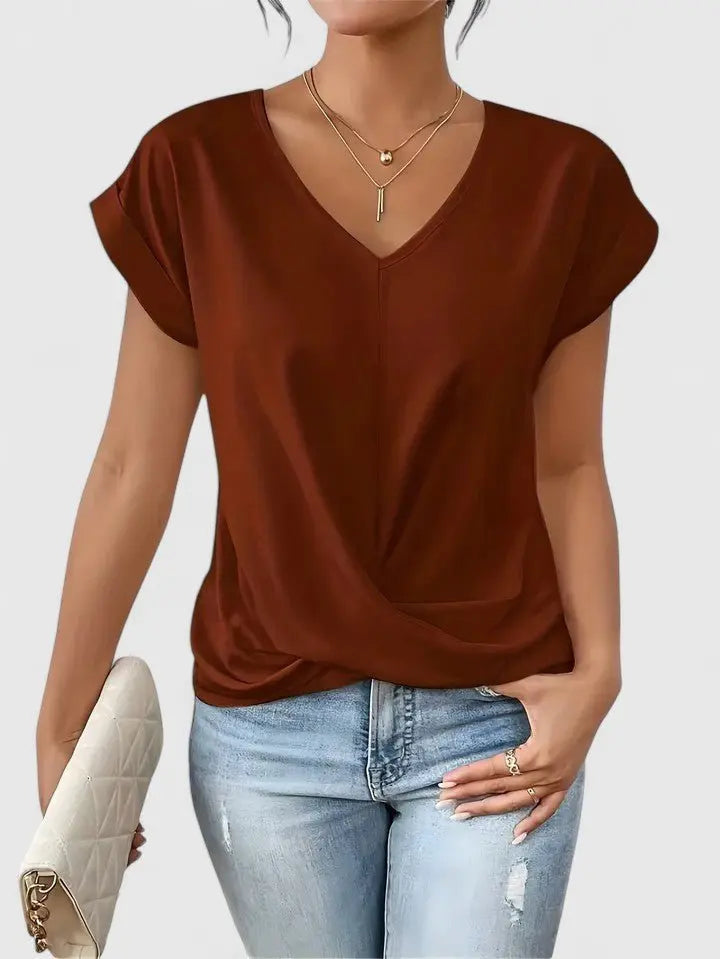 Stylish and versatile women's V-neck top, featuring a unique twist front and casual short sleeves.