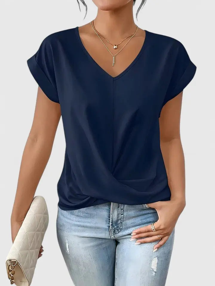 Everyday women's short sleeve V-neck blouse, featuring a stylish twist front for a relaxed look.