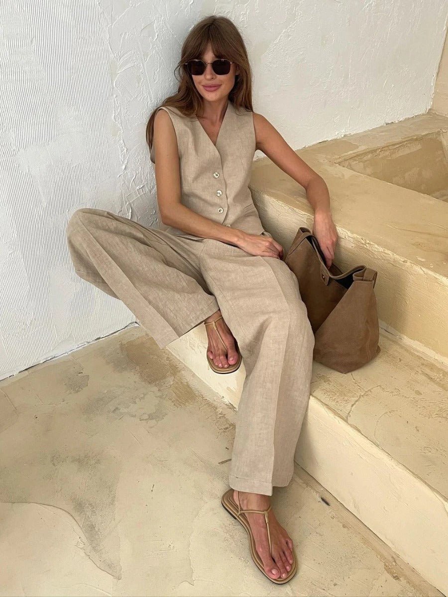 Stylish women's v-neck top & high-waisted pants two-piece set. Perfect for relaxed, casual summer fashion.