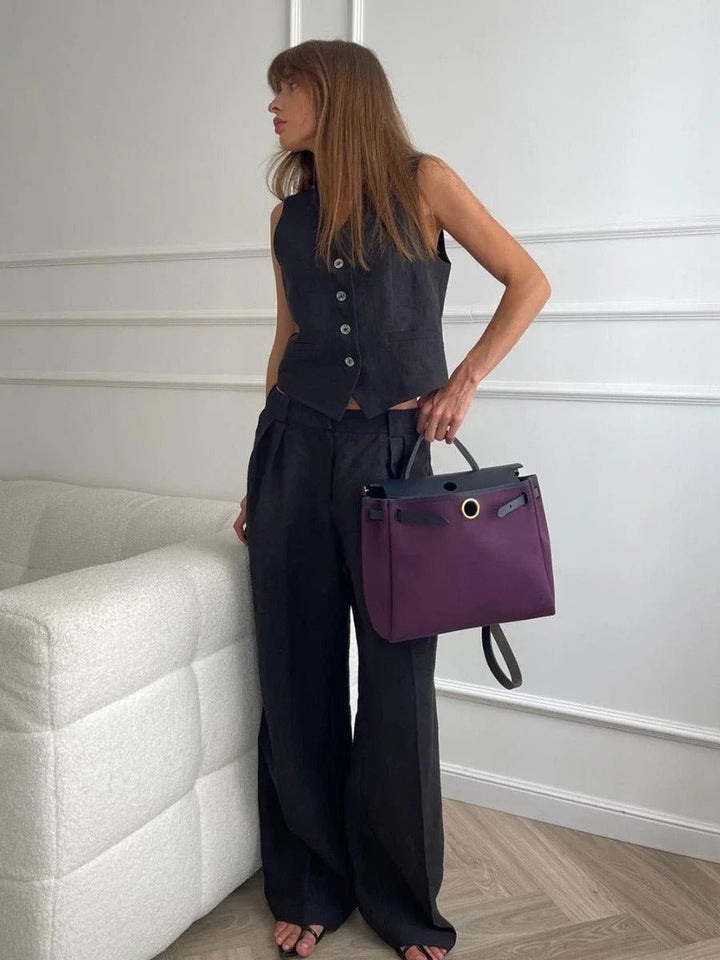Comfortable women's two-piece casual set featuring a V-neck top and high-waisted relaxed fit trousers.