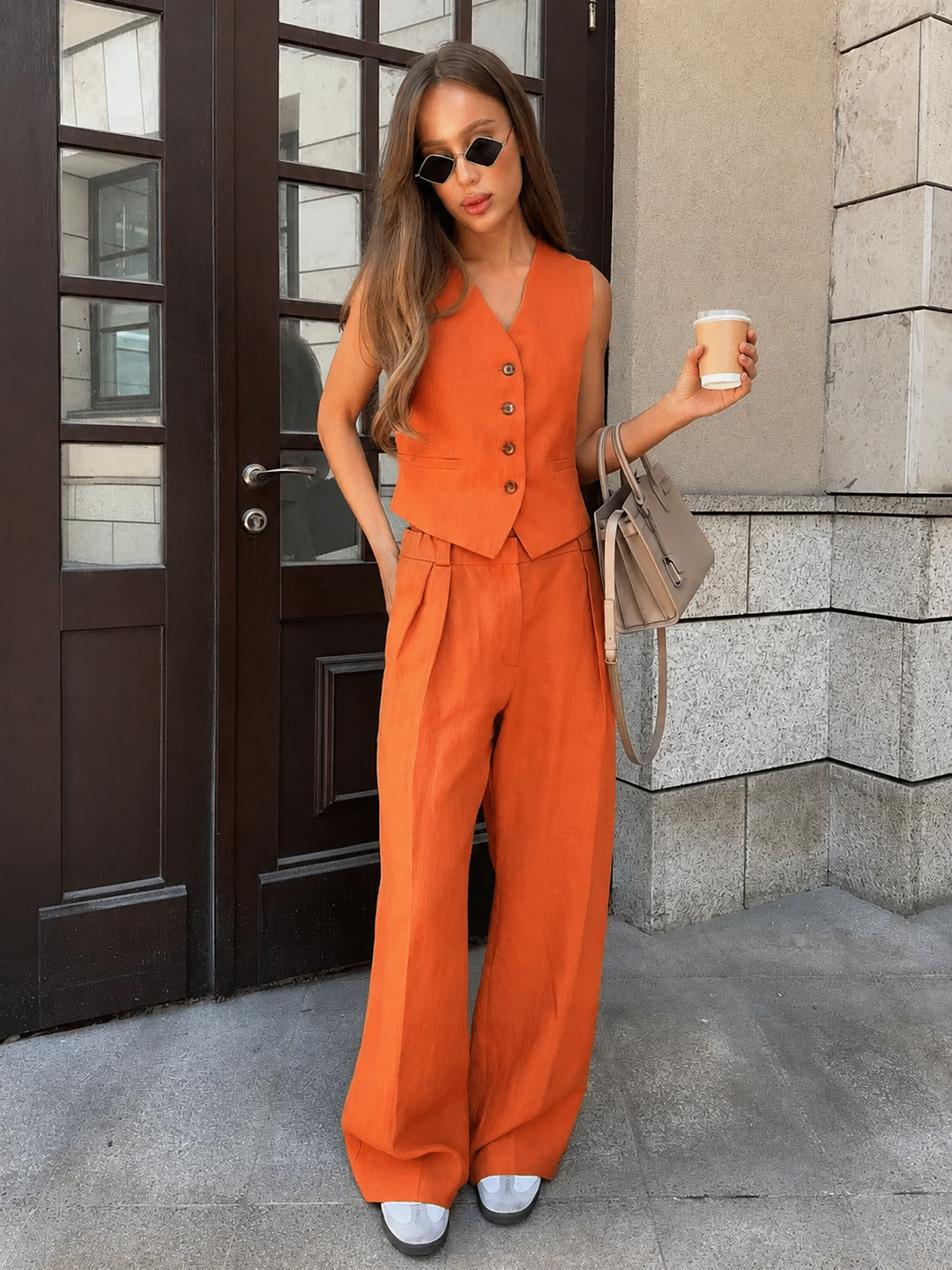 Relaxed fit women's V-neck two-piece set. Ideal comfortable casual wear for everyday or warm weather.