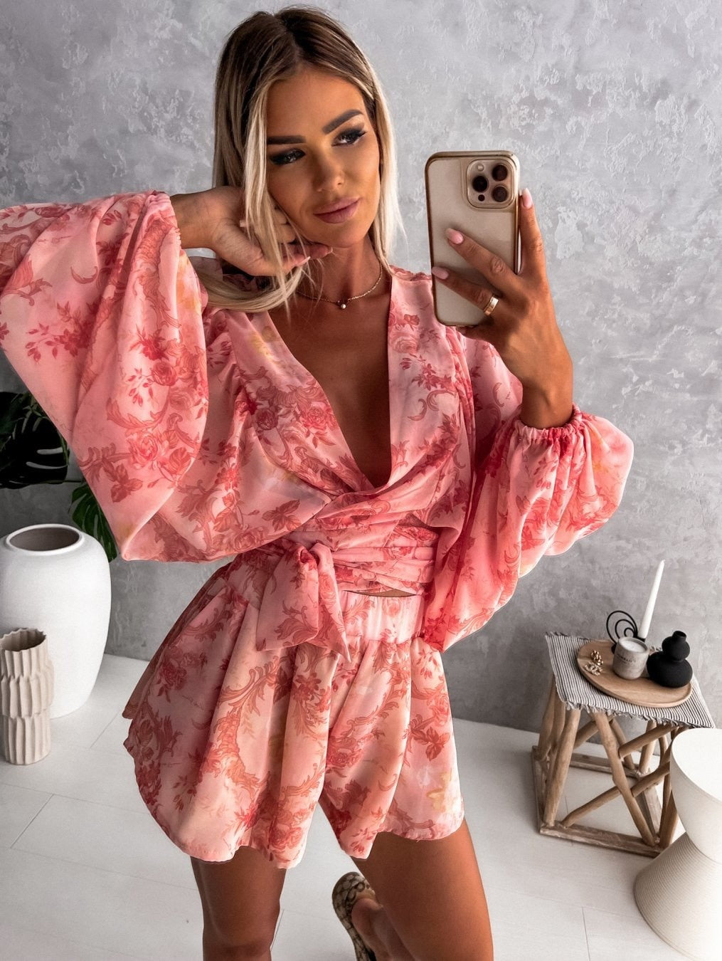 Women's V-Neck wrap front short set with tie waist & balloon sleeves. Perfect for casual summer days.