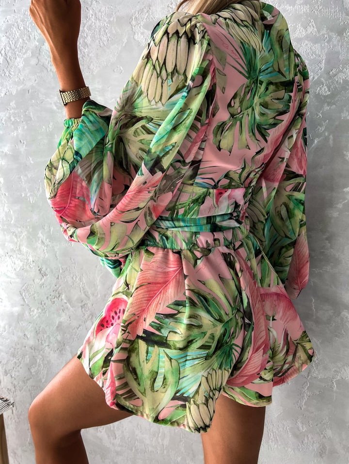Perfectly coordinated V-neck short set for women, with a wrap top, tie waist & elegant balloon sleeves.