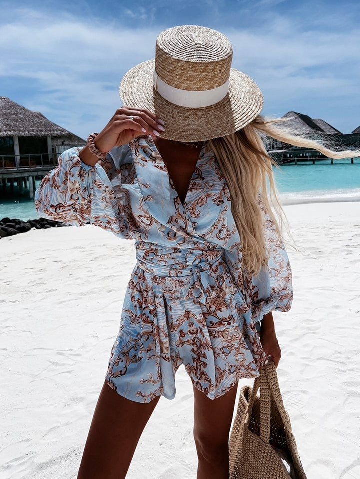 Elegant two-piece V-neck short set with wrap front & tie waist. Ideal for brunch or summer occasions.