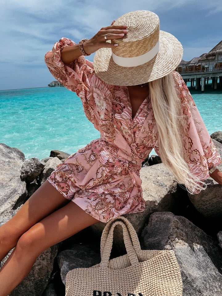 Fashionable women's two-piece V-neck short set with a flattering wrap front & adjustable tie waist.