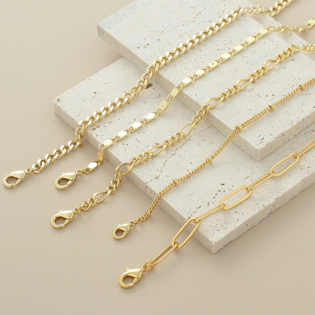 Elegant gold-tone adjustable anklet set for women. Versatile multi-style ankle bracelets, perfect for summer jewelry.