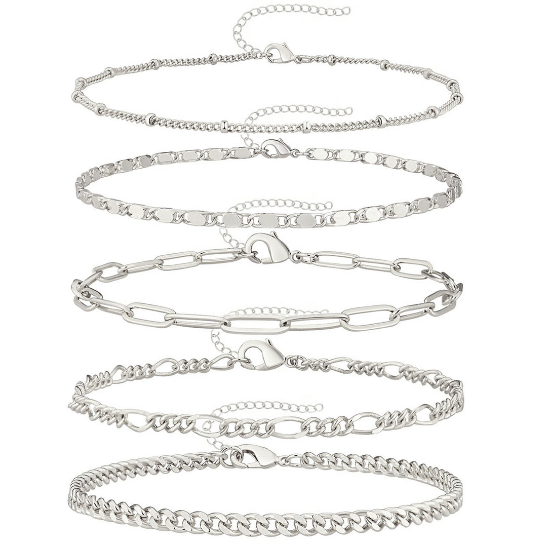 Multi-style women's adjustable anklet set. Gold and silver-tone versatile ankle bracelets for diverse fashion looks.