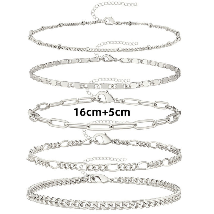 Trendy women's adjustable anklet set, a versatile fashion accessory. Gold/silver tone ankle bracelets for stylish looks.