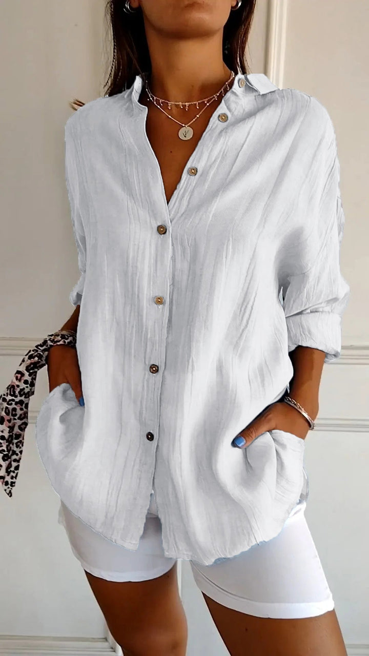 Women's versatile button-down shirt, perfect for everyday chic & casual wear.