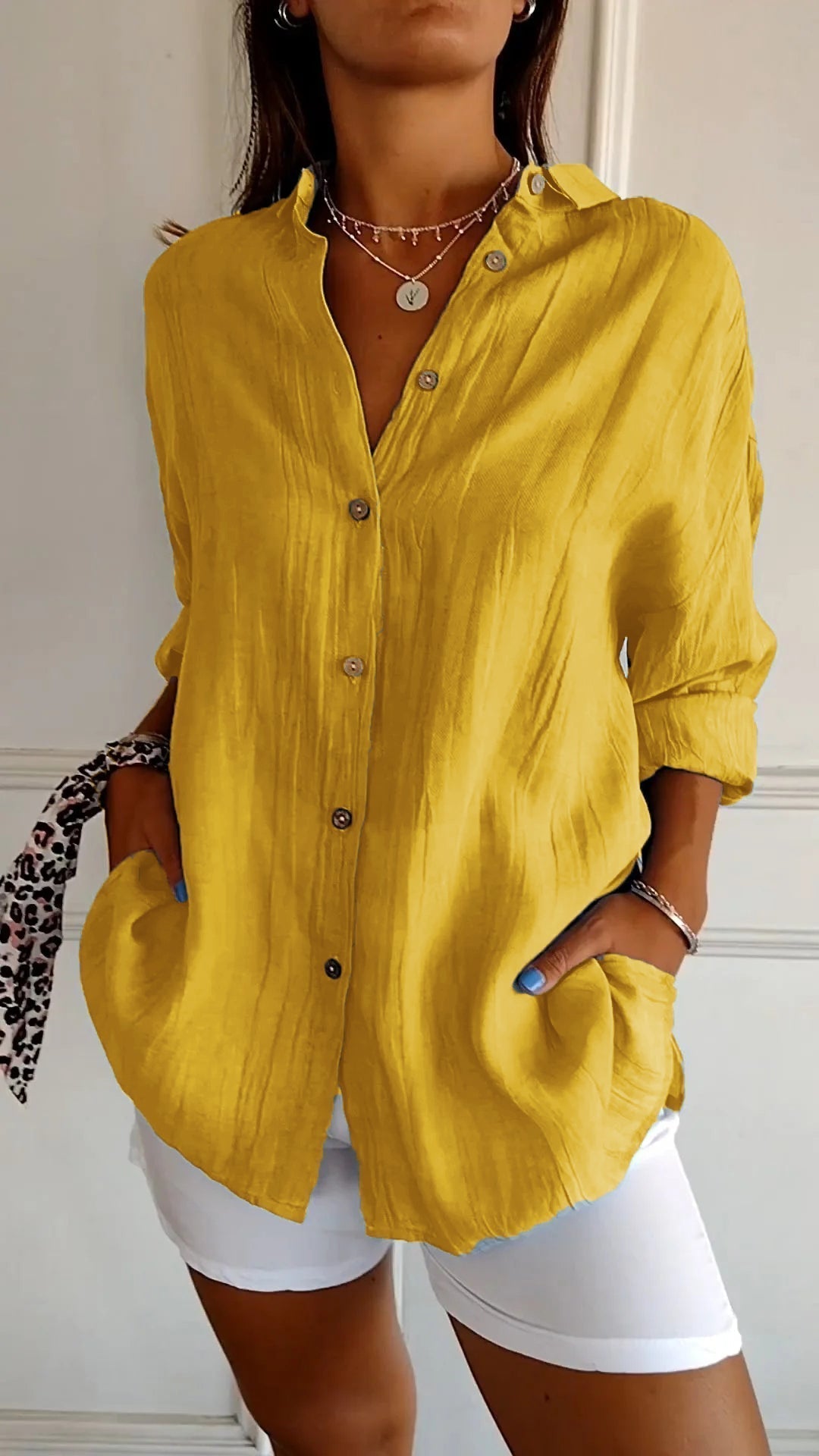 Stylish women's button-down shirt, a versatile long-sleeve blouse for all seasons.