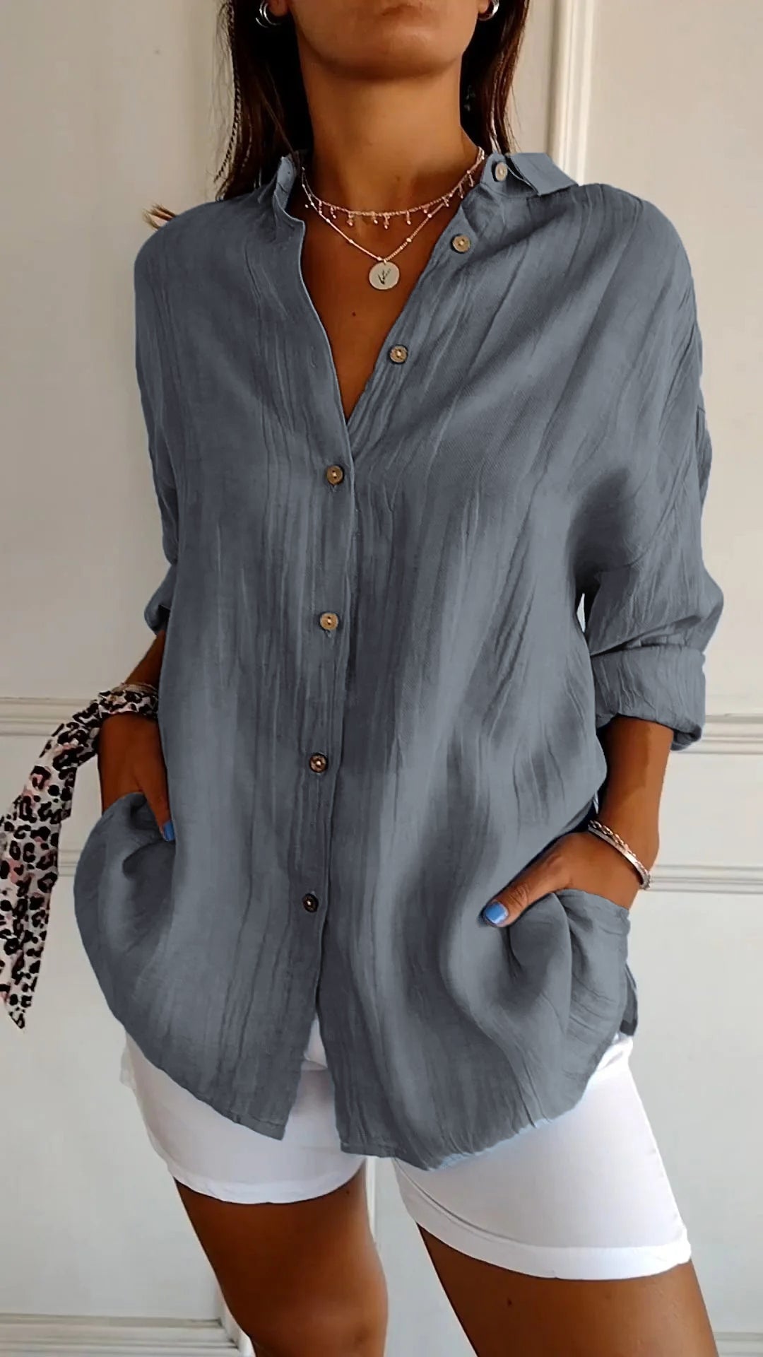 New women's button-down shirt, versatile for everyday fashion & roll-up sleeves.