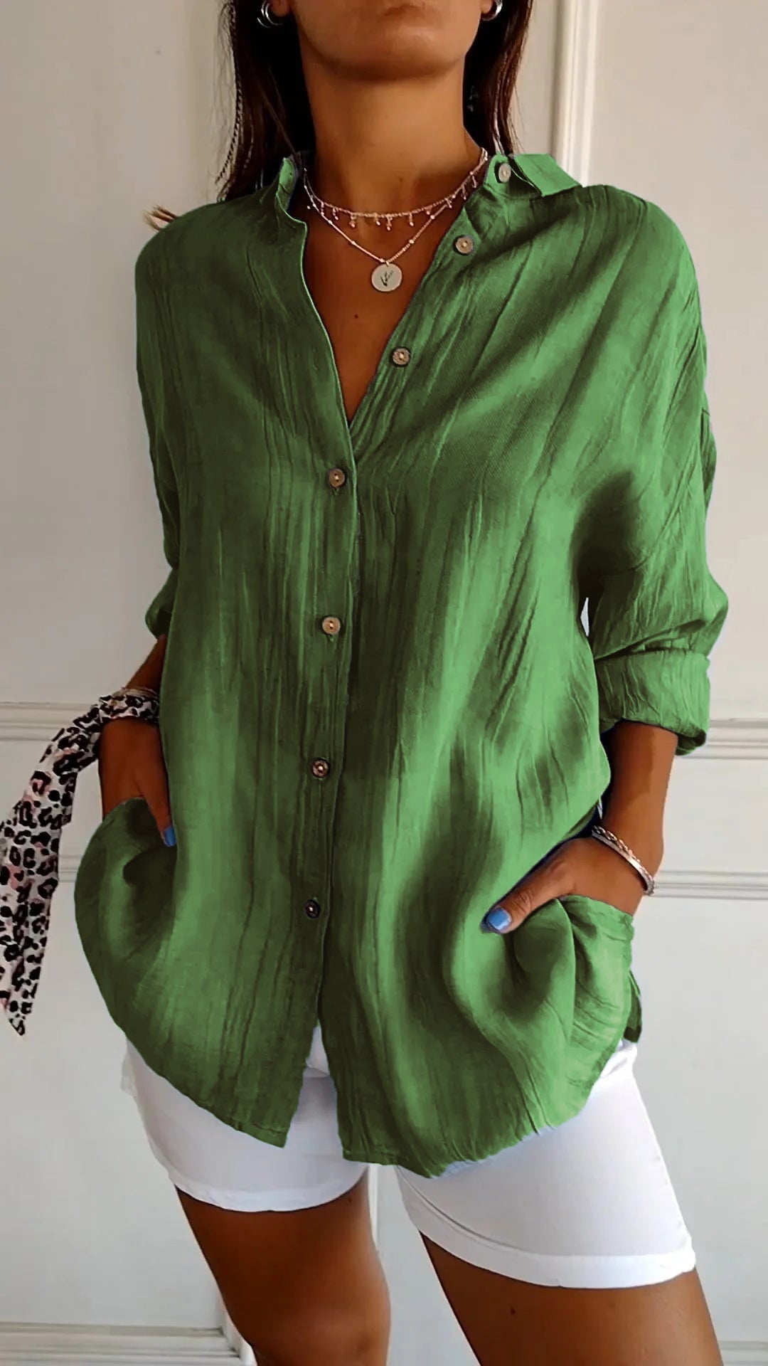 Elegant women's button-down shirt, perfect for chic office wear & casual outfits.