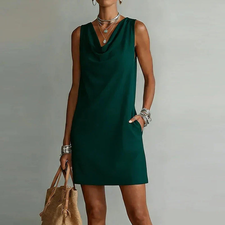 Women's versatile cowl neck mini dress with practical pockets, ideal for summer casual wear.