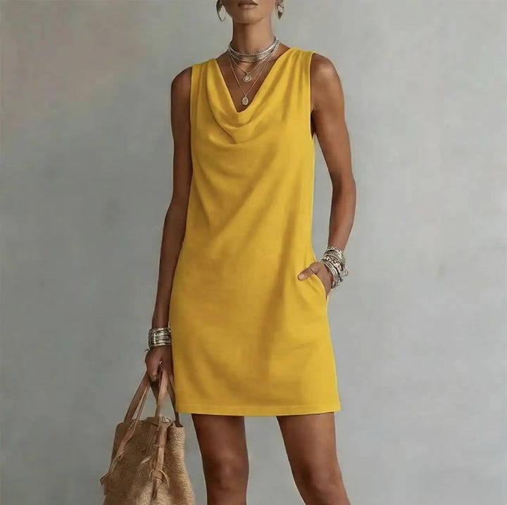 Everyday chic women's cowl neck mini dress, versatile for casual or smart casual, with handy side pockets.