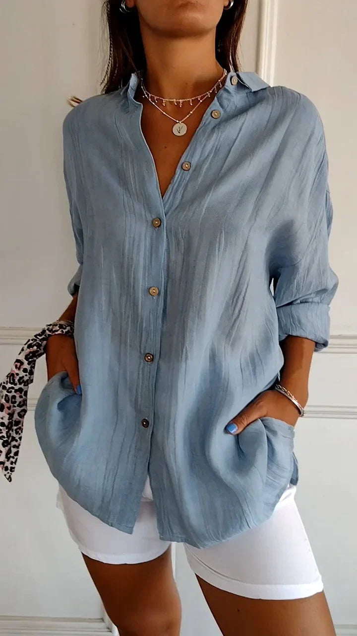Stylish women's button-down shirt, great for office, daily wear, and versatile long-sleeve fashion looks.