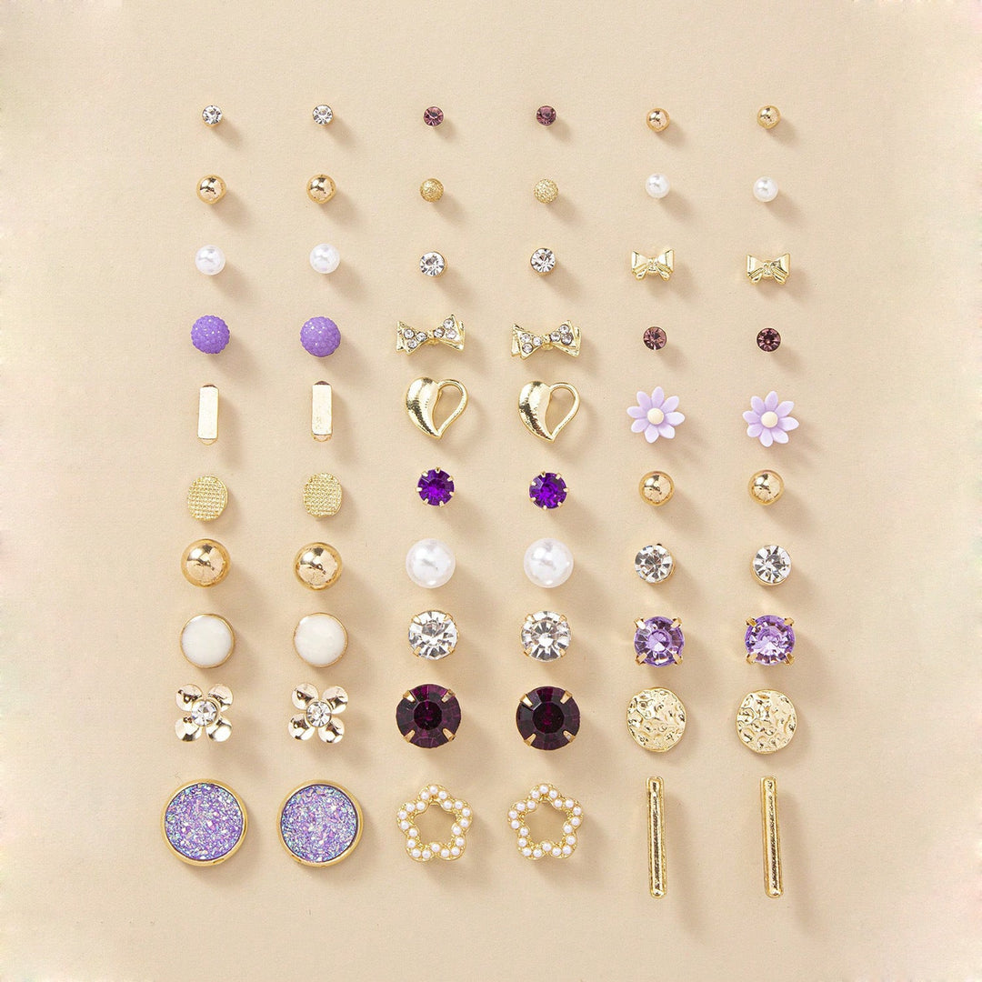 Detailed view of a versatile women's motif earring set, highlighting pearl, flower, and heart designs.