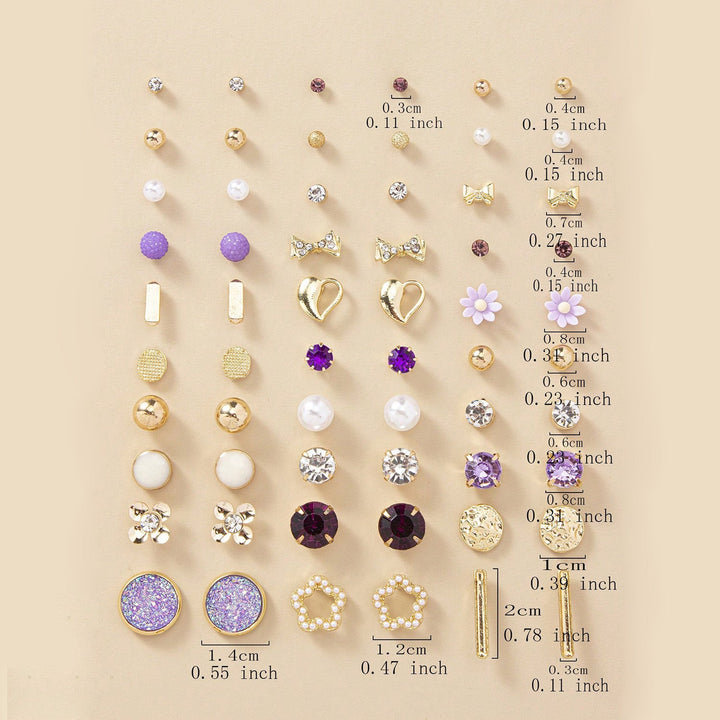 Stylish flower motif earrings in gold tone from a versatile women's jewelry set. Fashion accessory.