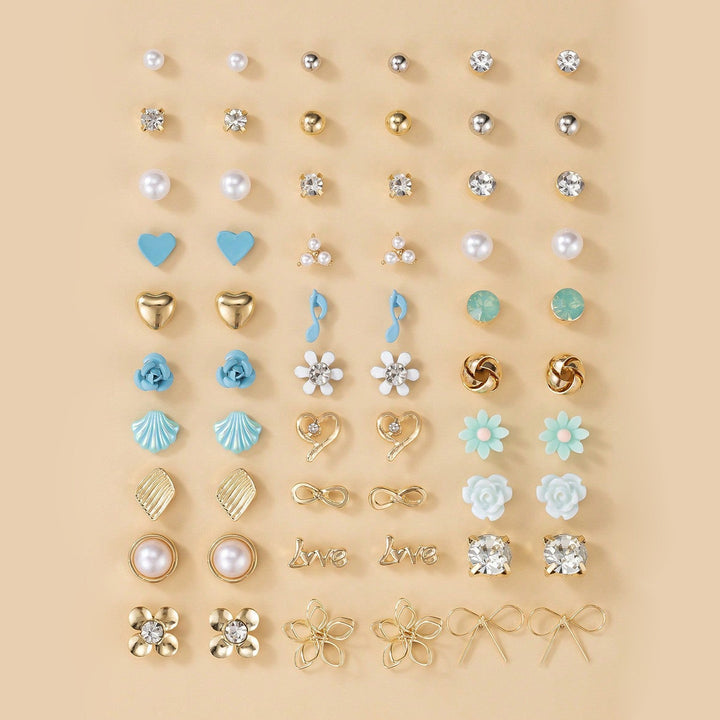 Charming heart motif earrings for women, part of a versatile earring set. Perfect gift & daily wear.