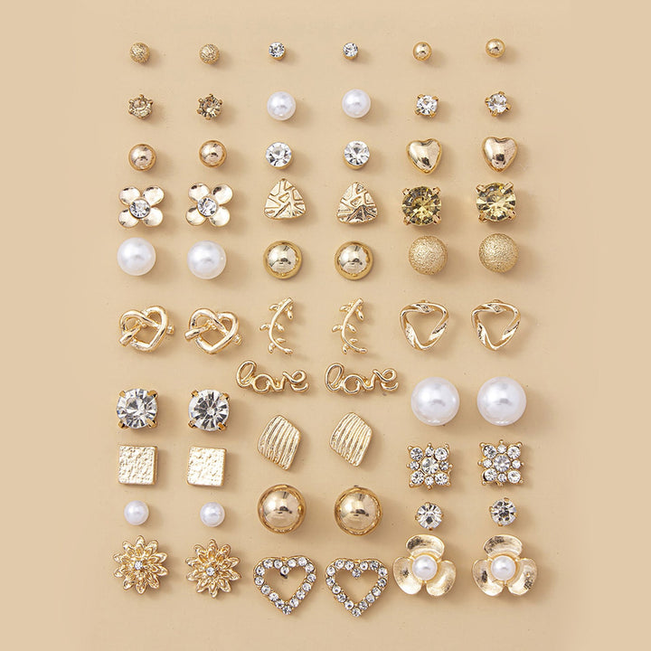 Close-up of delicate pearl earrings, a stylish piece from the women's versatile motif earring set.