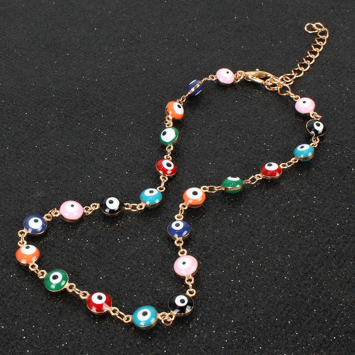 Fashionable multi-color beaded anklet for women, a lively accessory with vibrant beads and adjustable fit.