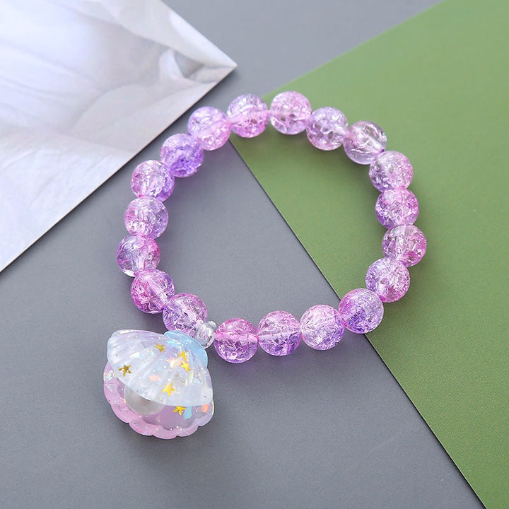 Women's colorful shell pendant beaded bracelet, perfect for summer fashion and beach vibes.