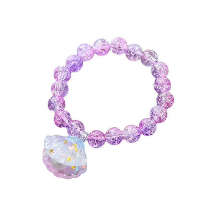 Women's colorful beaded bracelet with a unique shell pendant, capturing vibrant summer style.