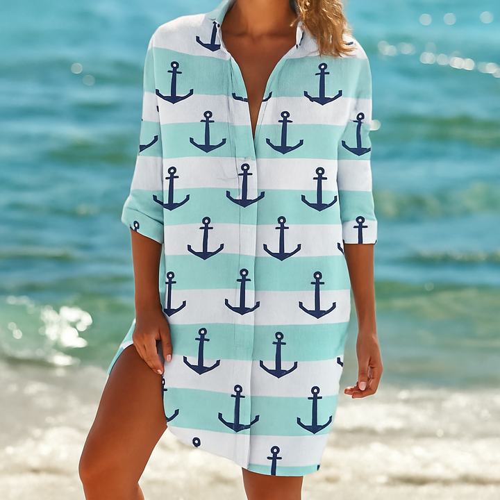 Women's vibrant short boho dress, a flowy beach cover-up ideal for summer and vacation wear.