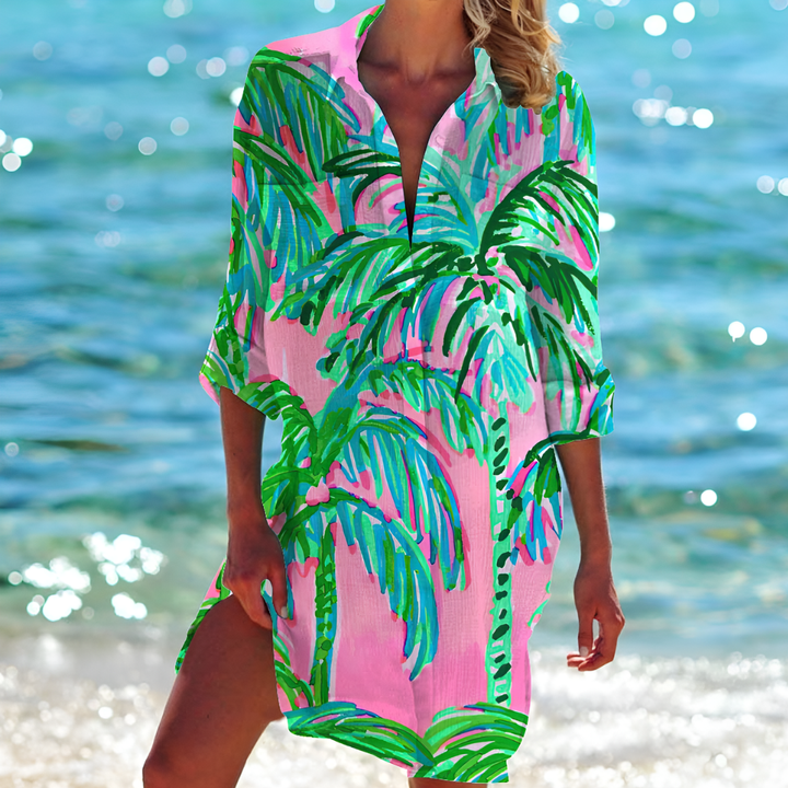 Comfortable oversized women's boho short dress, a vibrant flowy beach cover-up for summer.