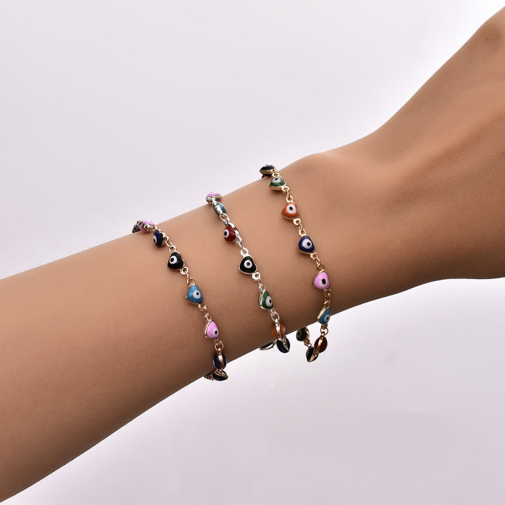 Women's vibrant evil eye charm anklet, a colorful fashion accessory.