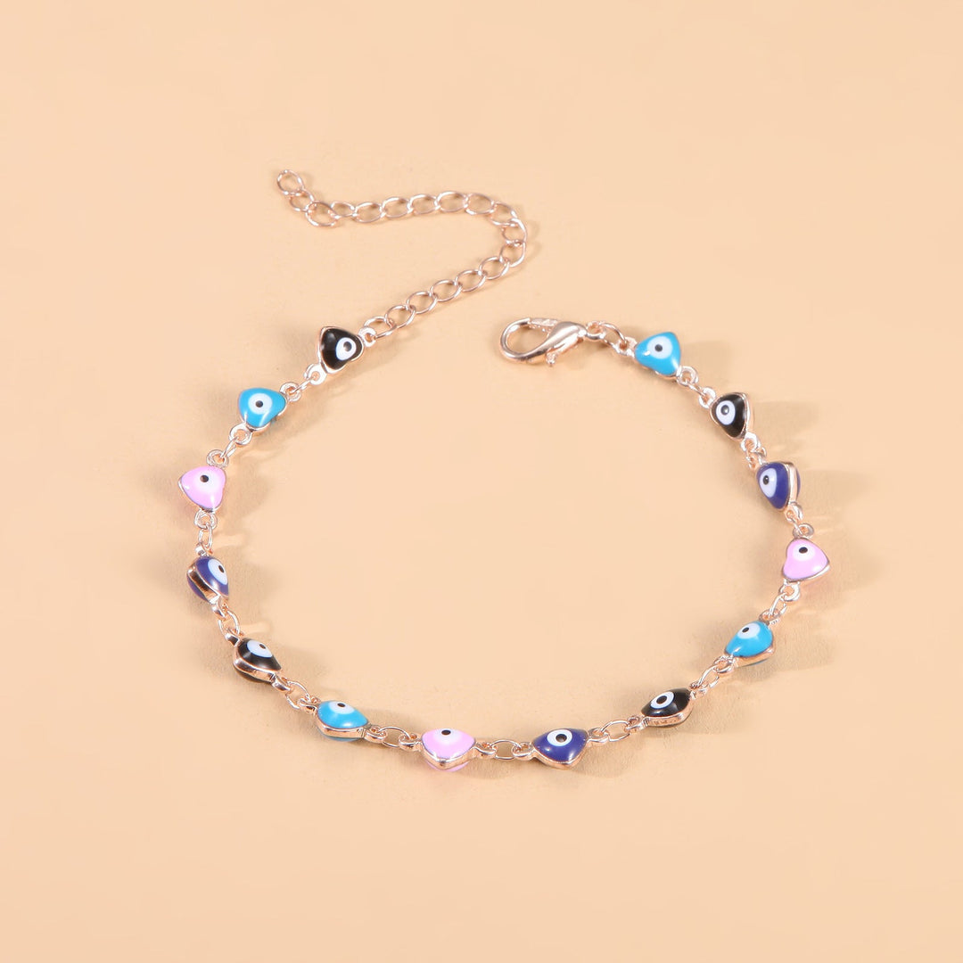 Boho style women's vibrant evil eye charm anklet, fashionable accessory.