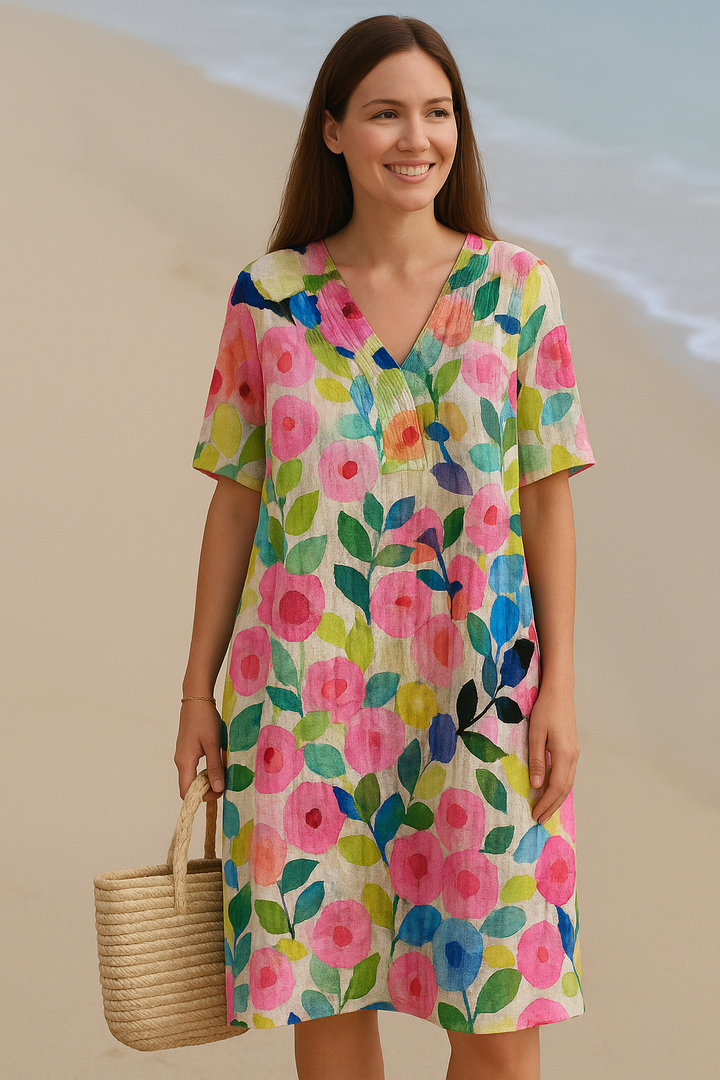 Women's vibrant floral spring/summer dress with a comfy relaxed fit. Perfect casual short sleeve everyday wear.