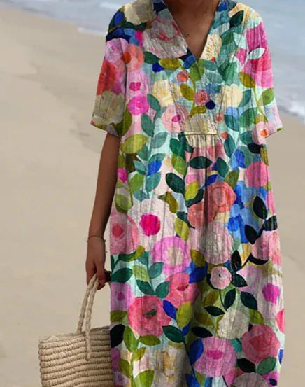 Relaxed fit women's vibrant floral dress. Short sleeve, comfy & perfect for spring, summer, or casual everyday wear.