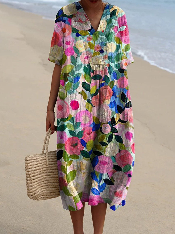 Women's vibrant floral summer dress, lightweight and flowy for beach or casual wear.