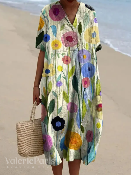 Lightweight women's summer dress featuring a delicate floral pattern, feminine & casual.
