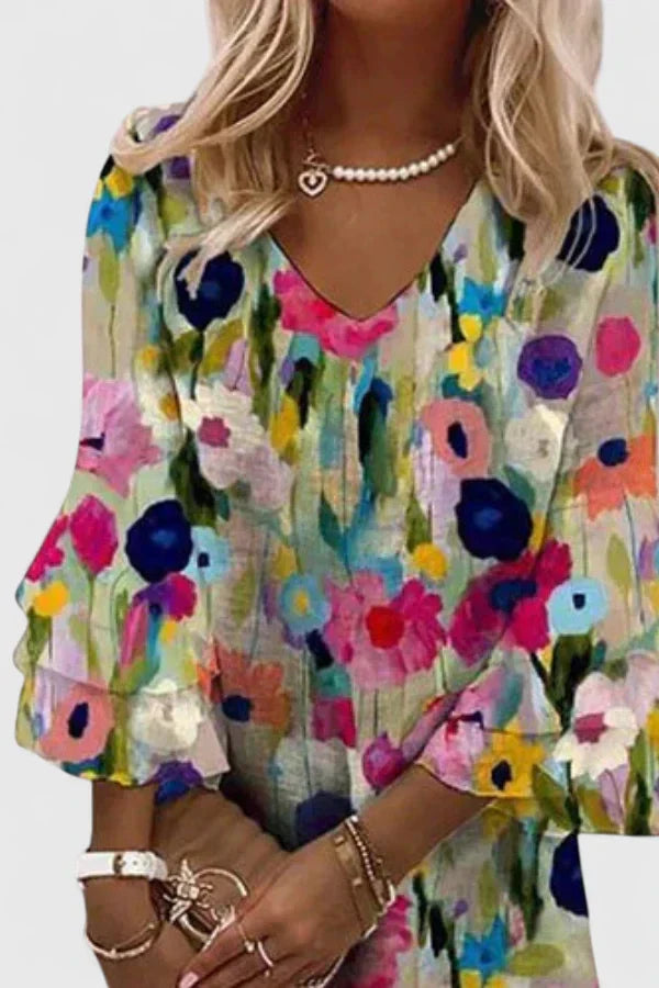 Elegant women's floral V-neck mini dress. This vibrant short summer dress is a casual fashion essential.