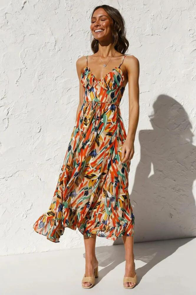 Women's vibrant flowy summer midi dress, perfect for casual elegance and a stylish vacation outfit.