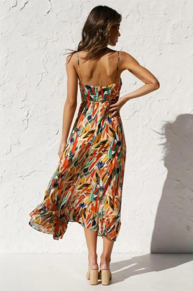 Colorful women's midi dress with vibrant patterns, ideal for summer beachwear and elegant casual style.