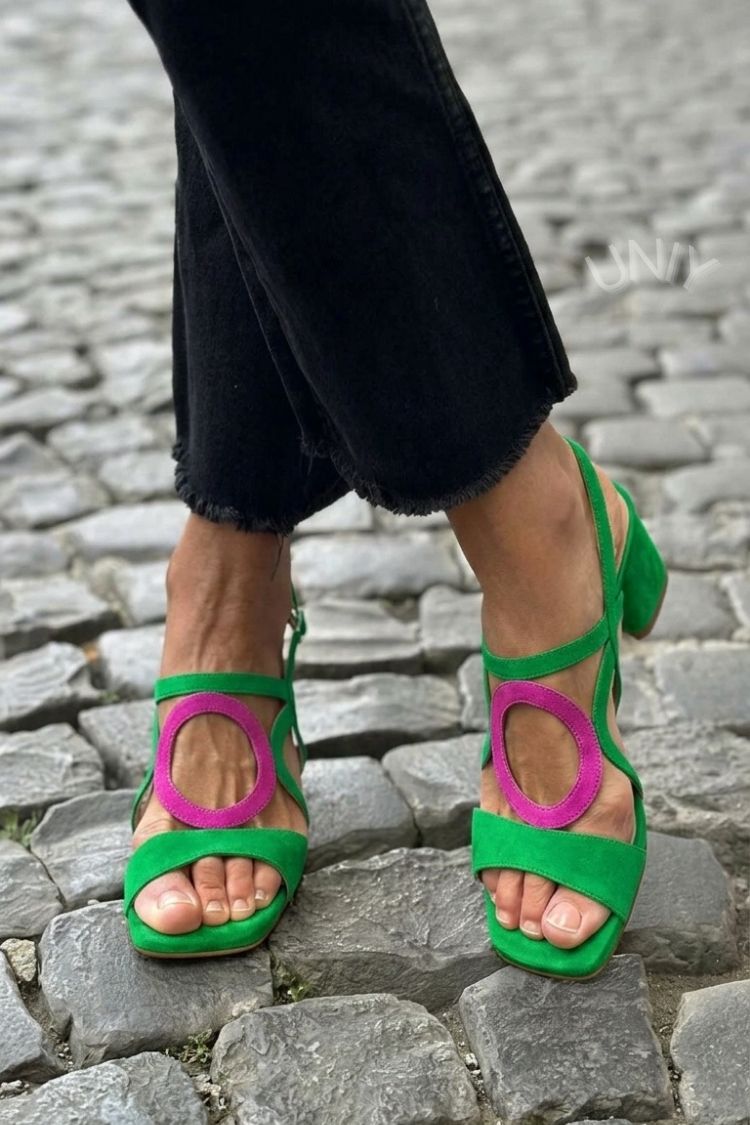 Fashionable green women's heeled sandals, great for elegant holiday wear.
