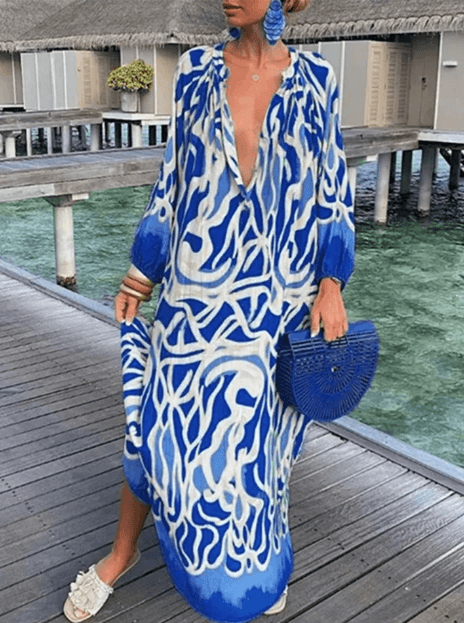 Women's vibrant printed summer dress, short, flowy, perfect for casual wear or beach vacation.