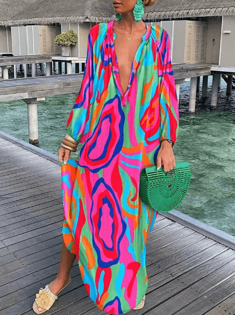 Casual women's short printed dress, vibrant colors, effortless style for summer days and beach outings.