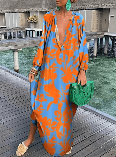 Vibrant printed summer dress for women, short and stylish, comfortable for everyday wear or vacation fashion.