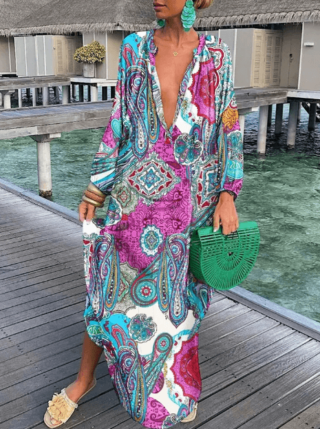 Short women's beachwear dress, vibrant summer print, comfortable and stylish, perfect for vacation fashion.