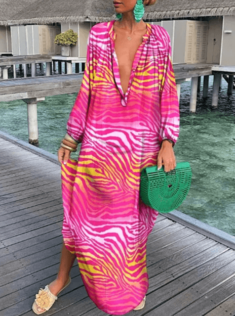 Stylish vibrant printed dress for women, short summer style, ideal for casual outings or beach vacation.