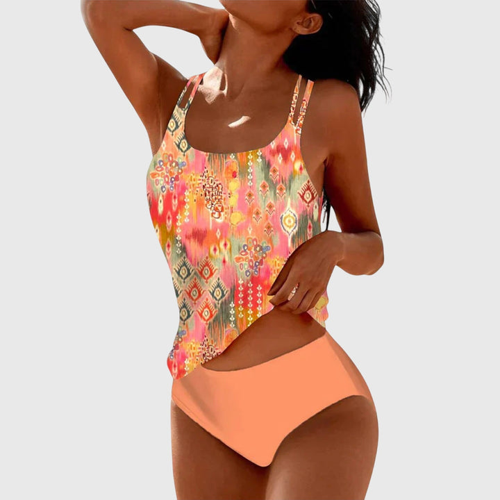 Women's strappy tankini swimsuit, a colorful and comfortable two-piece set for vibrant summer beach outings.