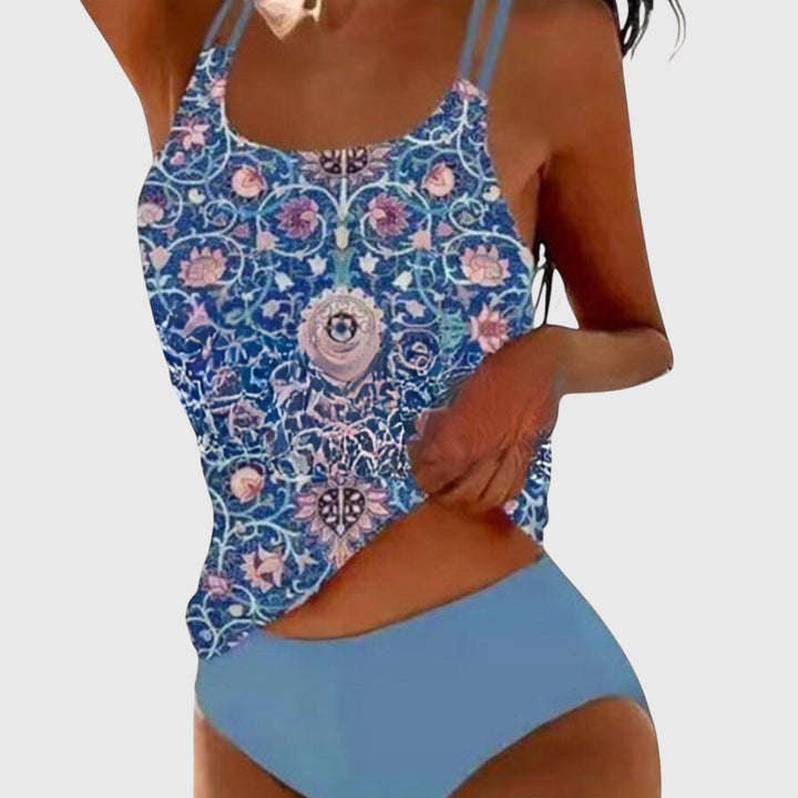 Get ready for summer with this women's vibrant strappy tankini. Flattering design for beach, pool, or vacation.