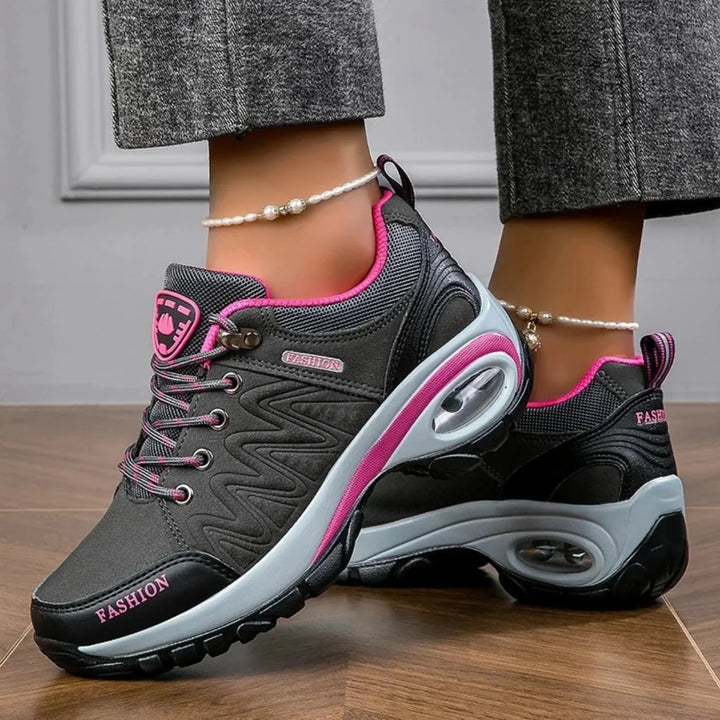 Women's vibrant water-resistant hiking shoes for comfortable outdoor adventures. Features anti-slip grip for trails.